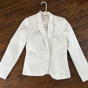 New white Calvin Klein blazer.